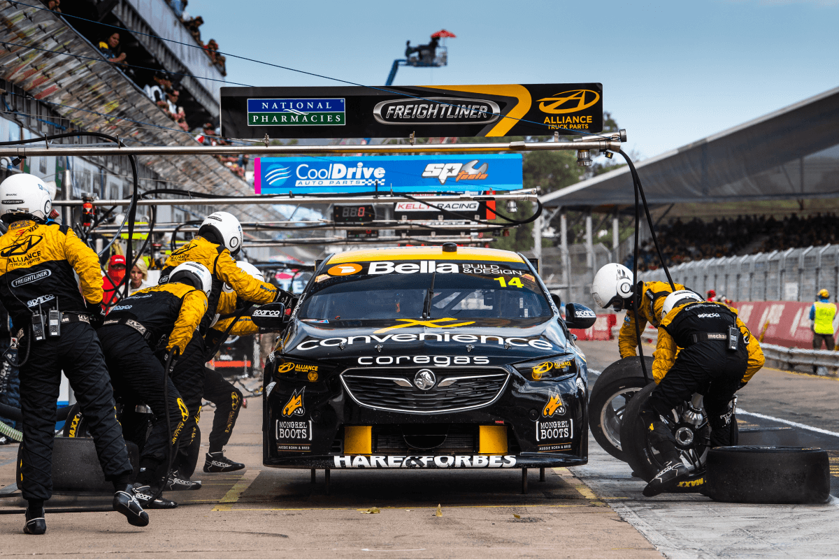 Motorsport car with bella design sponsor banner