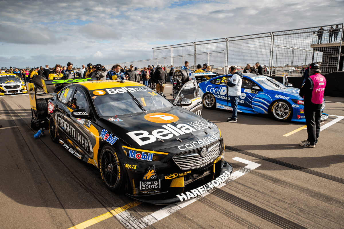 Motorsport car with bella design sponsor banner